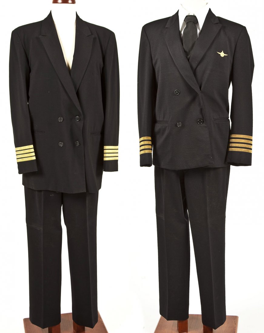2 Vintage Pan Am Uniforms: DESCRIPTION: Two vintage Pan Am uniforms including two black jackets with gold cording at wrists (one with Pan Am pin), two black pants, white short sleeve shirt and black tie. MEASUREMENTS: Jacket 19