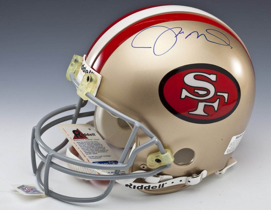 Joe Montana Signed Full Size 49ers Helmet: DESCRIPTION: Full size Riddell San Francisco 49ers helmet signed by Joe Montana to the top in blue felt tip. Housed in original Riddell box. PROVENANCE: Obtained by consignor's wife who worked for Gia