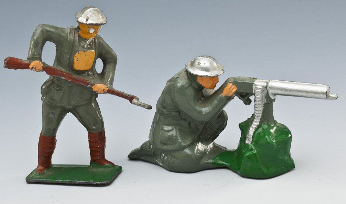 American Metal Toys (Jones) German Soldiers: DESCRIPTION: Two rare American Metal Toys Dimestore toy soldiers in grey paint, representing Germans. Soldier in gasmask bayonetting downward and machine gunner. U.S. prewar production circa late 1930