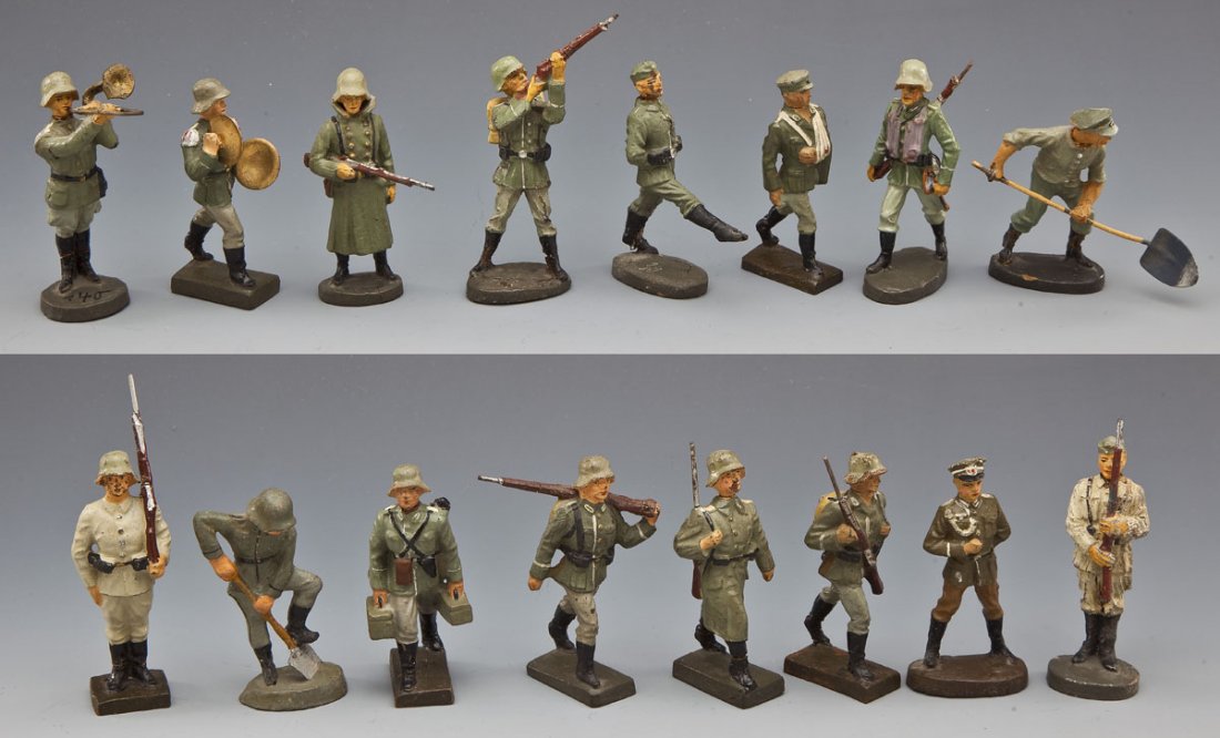 Lineol & Elastolin Action, Drill & Marching Group: DESCRIPTION: Sixteen German Army soldiers in various action, marching, and drill poses, consisting of rare Lineol recruit standing at attention rifle on shoulder, Elastolin recruit at present arms, El