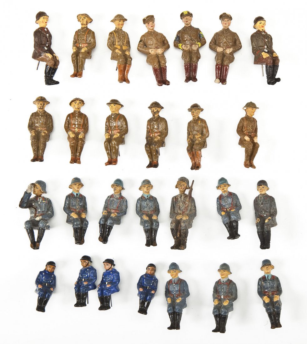 27 Elastolin, Lineol & Others Seated Military Figs: DESCRIPTION: Consists of twenty-seven miscellaneous seated German, British, American, Swiss, and other nationalities. Includes some Luftwaffe personnel and German firemen. These figures were made to g