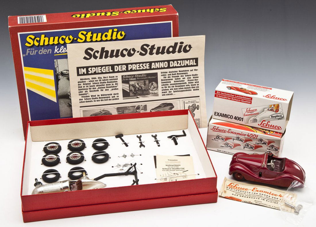 Schuco Mercedes Racecar & Examico 4001: DESCRIPTION: Lot consists of kit to build Schuco Mercedes Racecar. Including car body, rubber tires, various tools, instructions, and etc. Near-mint in original box. Also includes boxed Schuco Examico