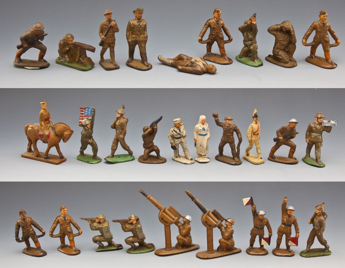 Auburn Rubber Dimestore Toy Soldier Lot: DESCRIPTION: Lot consisting of twenty-eight Auburn Rubber prewar toy soldiers. Includes scarce anti-aircraft gunners, nurse in white, patient for stretcher, signalmen with semaphore flags (one damaged