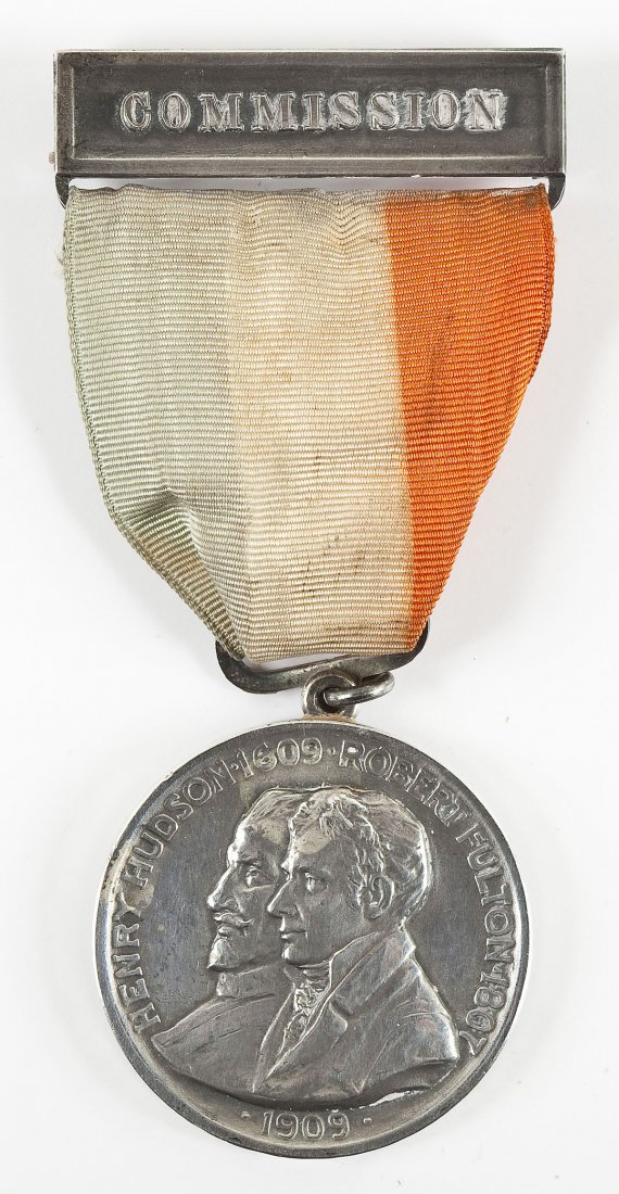 Sterling Hudson-Fulton Commissioner's Badge: DESCRIPTION: Official commissioner's sterling silver badge from the Hudson-Fulton Commission in 1909. Obverse with Spirit of Progress in winged cap holding the Half Moon Ship and the steamboat Clermon