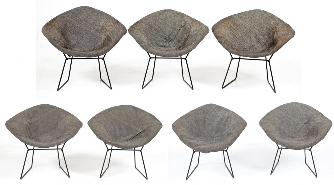 7 Knoll Harry Bertoia Diamond Chairs: DESCRIPTION: Set of seven Knoll Harry Bertoia Diamond chairs. Black enameled steel frames with gray tweed upholstery. All but one retain original Knoll International tags. PROVENANCE: Purchased by con
