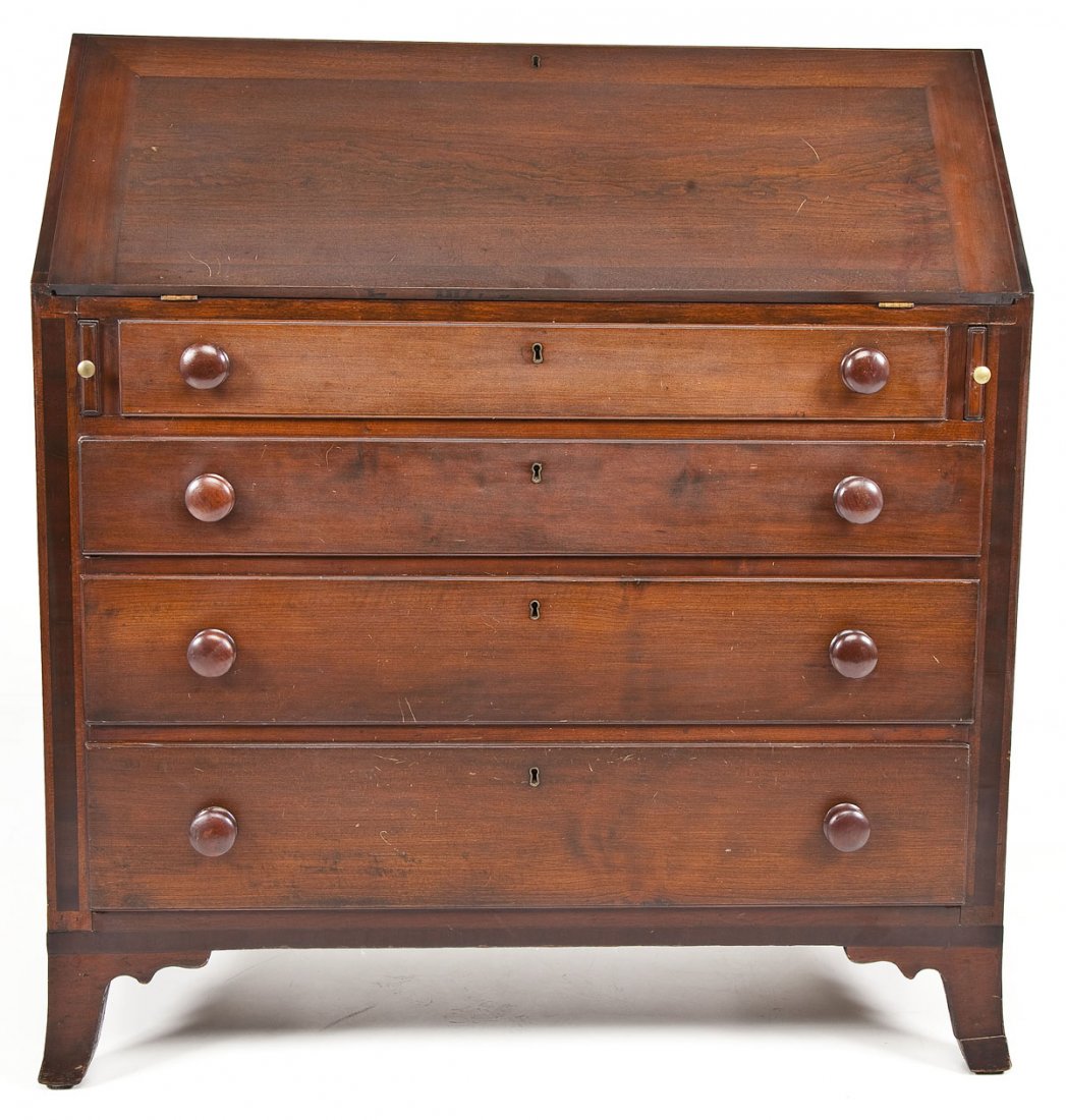 Hepplewhite Fall Front Desk: DESCRIPTION: A Federal Hepplewhite fall front desk in walnut, probably central Pennsylvania, circa 1800. The form consisting of a hardwood case resting on flared French bracket feet with four drawers 