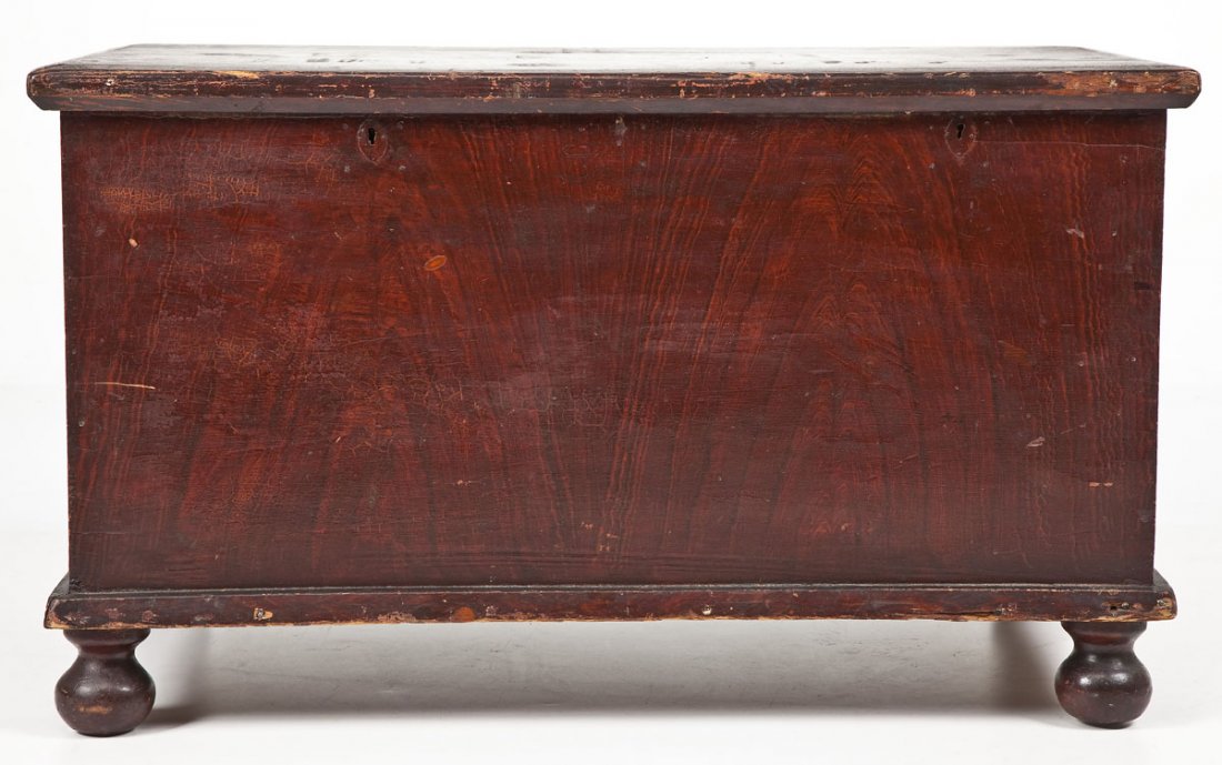 Grain Decorated Pennsylvania Blanket Chest: DESCRIPTION: A late 19th century grain decorated softwood blanket chest made in South central Pennsylvania. Of typical six board construction with a molded overhanging top and four turned ball feet be