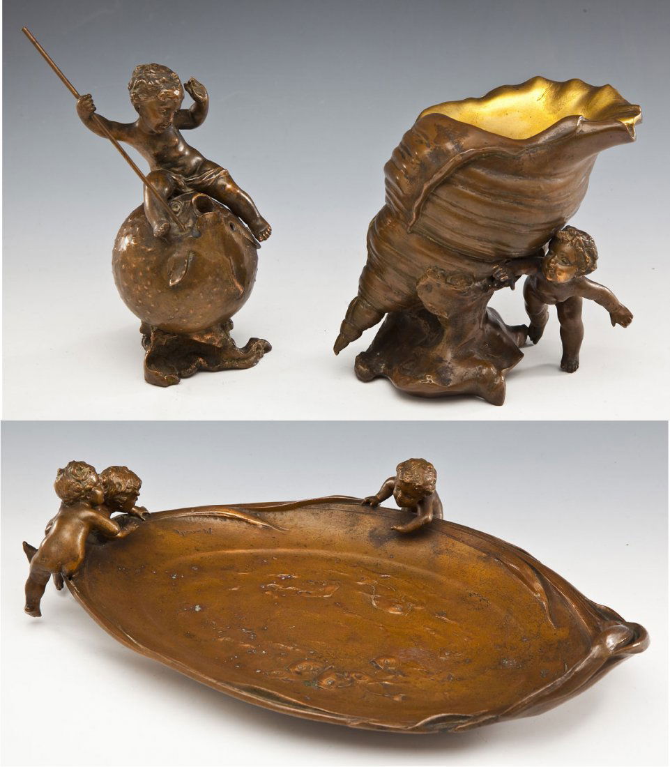 3 Ignaz Mansch Art Nouveau Vessels with Putti: DESCRIPTION: Three Art Nouveau pewter vessels with bronze finish and gilding by Ignaz Mansch (Austrian, 1867-1926). Include: 1) 7-1/4" bud vase in the form of a putto with lance astride a puffer fish