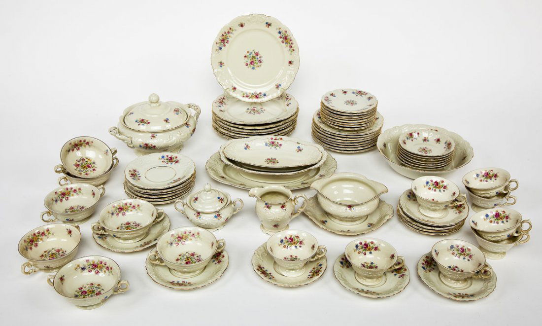 69 Pc KPM 122 Pattern Dish Set: DESCRIPTION: Sixty-nine piece Königliche Porzellan-Manufaktur Friederikg dish set. KPM 122 pattern, flowers around border with center floral reserve, gilt and scroll relief border. Marked for KPM and