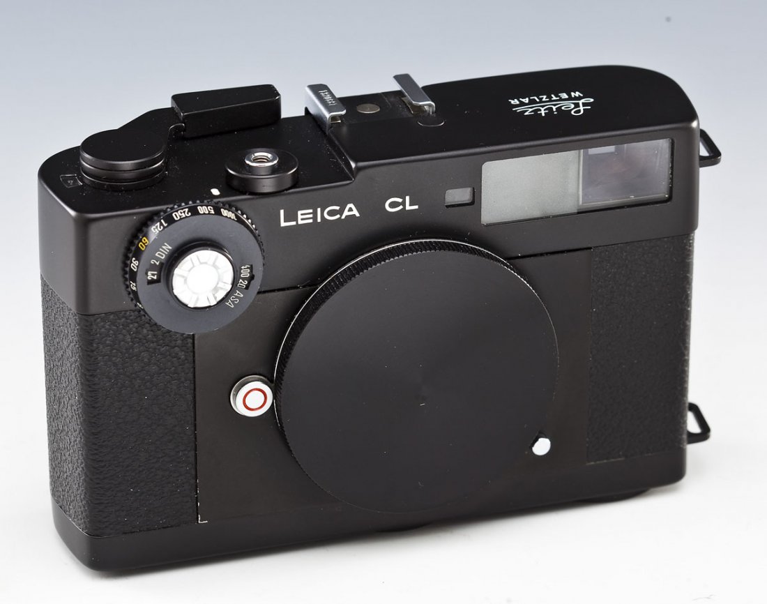 Leica CL Camera Body: DESCRIPTION: Leica CL camera body serial #1320681, marked "Leitz Wetzlar Leica CL". Circa 1973-1974. MEASUREMENTS: 4-3/4" wide. CONDITION: Working condition. Clean.