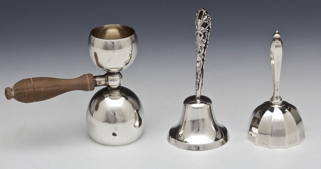 Sterling Silver Jigger & 2 Bells: DESCRIPTION: Three pieces of sterling silver. Includes: 1) Wallace Sterling jigger with wooden handle. Larger side monogrammed "W.J.D.". Smaller side monogrammed "M.S.D.". Marked for Wallace Sterling.