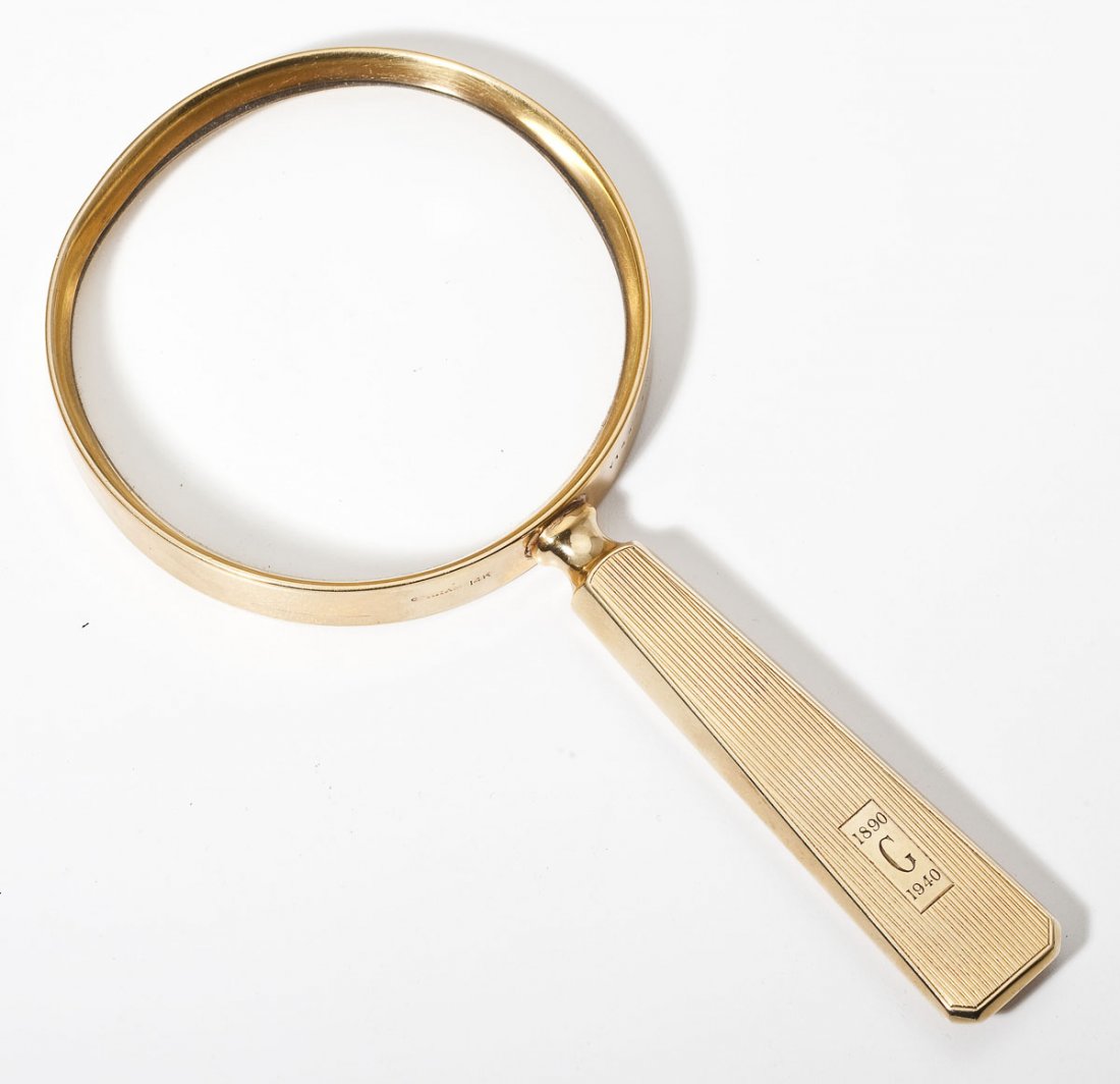 Gorham 14K Magnifying Glass: DESCRIPTION: A Gorham 14K yellow gold magnifying glass. Deco style handle with linear decoration and monogram "1890 G 1940". Marked "Gorham 14K Y149-70". PROVENANCE: Consignor’s great-grandfather. C