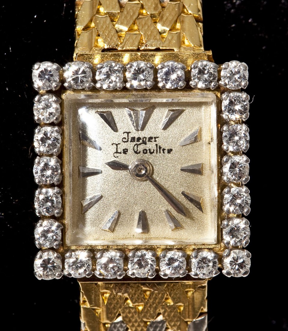 Lady's Jaeger LeCoultre Diamond Wristwatch: DESCRIPTION: Lady's marked 750 Jaeger LeCoultre wristwatch. Silvered square dial with silver numeral markers marked "Jaeger-LeCoultre Swiss (18) Eighteen Jewels Adj. to (4) Four Pos.". Movement marked