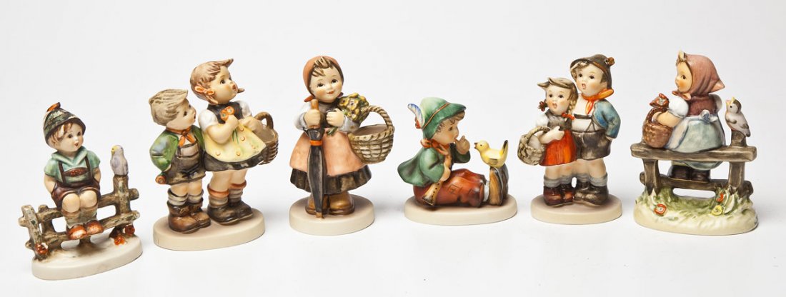 6 Assorted Hummel Figurines: DESCRIPTION: Six assorted Hummel figurines. Includes: 1) Singing Lesson. #63. 1972-1979. 3-1/4" high. Crazing on base. 2) To Market. #49 3/0. 1979-1990. 4-1/2" high. No defects to figure. 3) Pay Atten