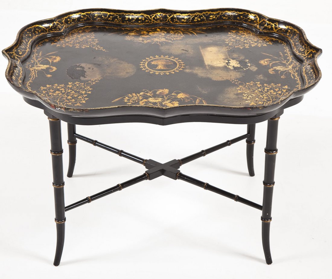 Gilt Tole Tray Table: DESCRIPTION: Antique tray table. The tole tray top decorated with scrolling, foliage and wheat in gilt and resting on a bamboo style base. MEASUREMENTS: 32" x 24" x 20" high. CONDITION: Tray with fadi