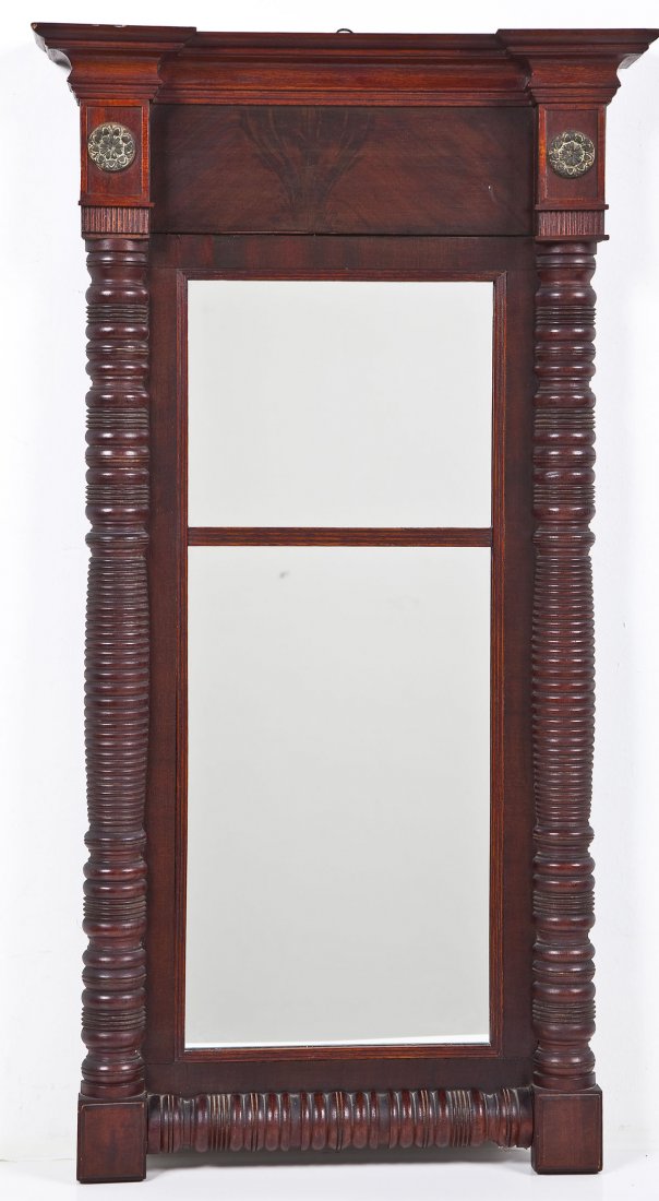 Mahogany Federal Wall Mirror: DESCRIPTION: Mahogany and mahogany veneered Federal wall mirror having an architectural cornice over divided panels of glass flanked by spiral turned columns surmounted by pilasters with applied brass