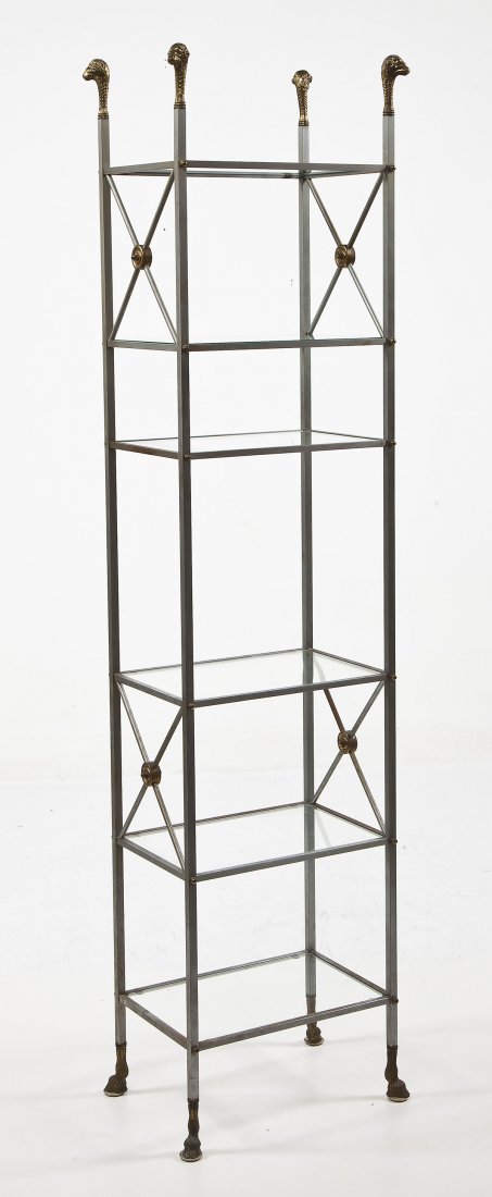 Glass & Metal Etagere: DESCRIPTION: An etagere of metal and glass with X-shaped supports, the top ending in brass ram's head finials and resting on hoof form feet. MEASUREMENTS: 18" x 12" x 78" high. CONDITION: Light wear a
