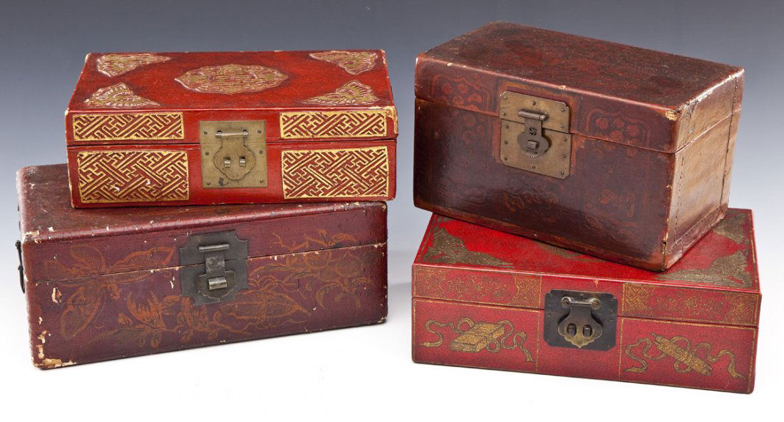 4 Chinese Lacquered & Leather Covered Boxes: DESCRIPTION: Four Chinese lacquered and leather covered boxes. Includes: 1) Mahjong set in red and gold carved and lacquered case with brass hardware. 11-3/4" x 7" x 3-3/4" high. Edge wear and losses.