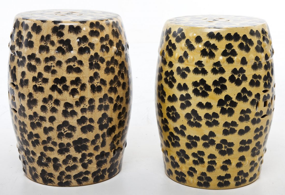 Pair of Leopard Print Garden Stools: DESCRIPTION: Pair of leopard print ceramic garden stools. Marked "Made in China". MEASUREMENTS: Each 13" diameter x 17-3/4" high. CONDITION: No defects noted.