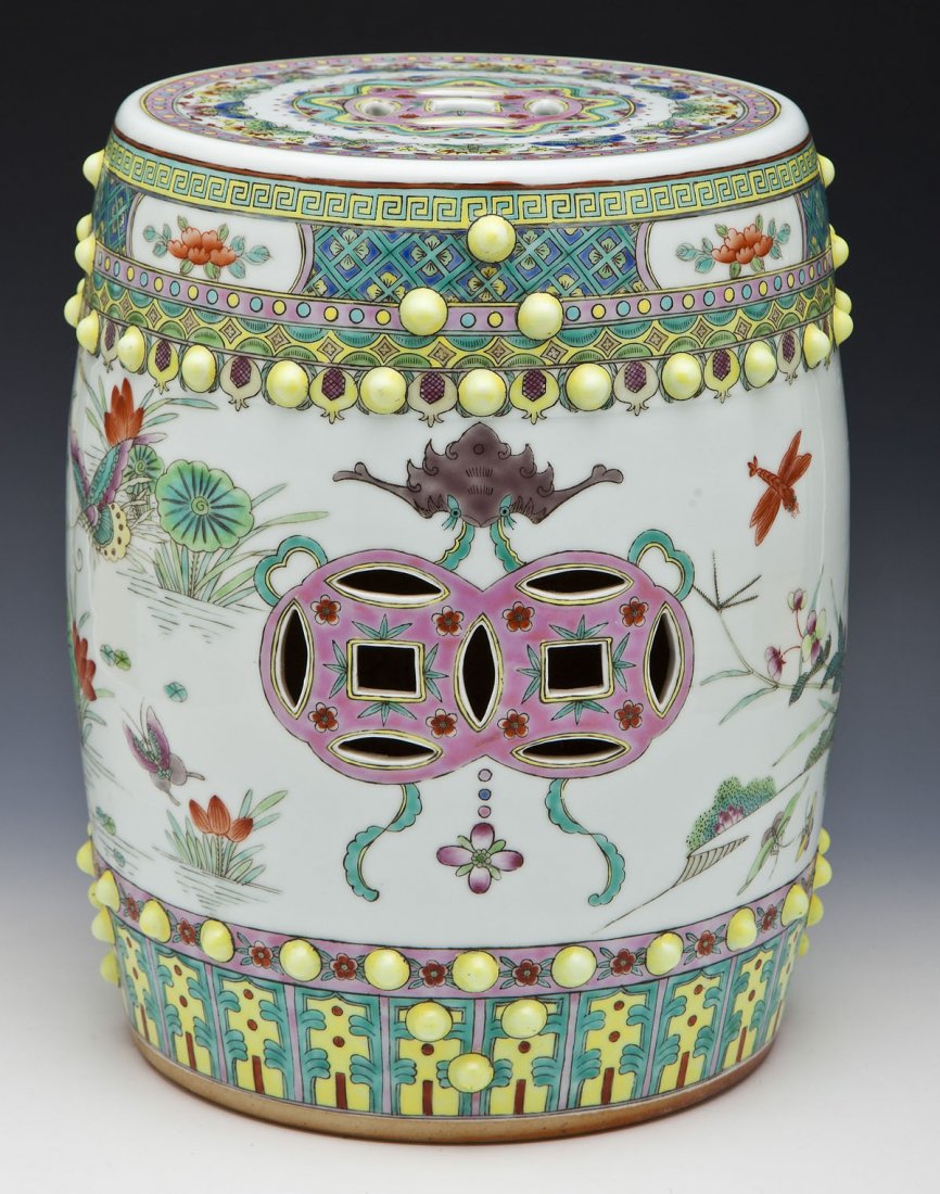 Mottahedeh Chinese Export Style Garden Stool: DESCRIPTION: A Mottahedeh Chinese Export style garden stool decorated overall with butterflies, lilies, and auspicious symbols. Marked under base "A Mottahedeh Design". MEASUREMENTS: 11" diameter x 14