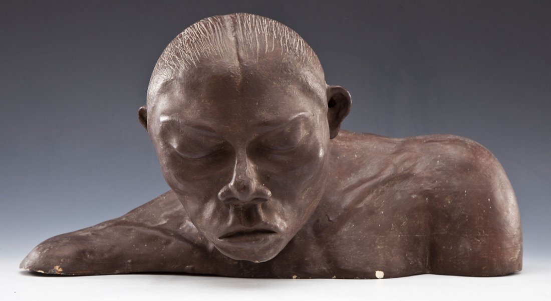 Folk Art Plaster Bust: DESCRIPTION: Folk art plaster bust of a man. PROVENANCE: Given to the consignor's husband (a resident of the Menninger Foundation, Topeka, Kansas) by a patient. MEASUREMENTS: 17" long x 9" high. CONDI