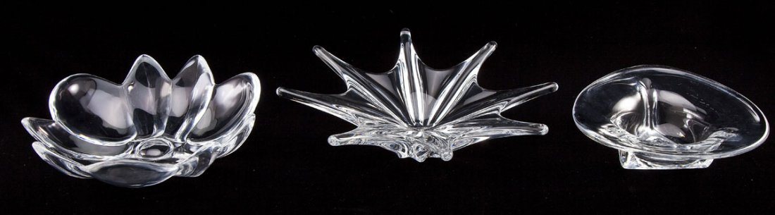 3 Crystal Bowls incl Orrefors & Baccarat: DESCRIPTION: Three signed bowls. Includes: 1) Baccarat star bowl. Stamped for Baccarat. 15-3/4" diameter x 4-1/2" high. Five flakes under base. 2) Orrefors flower blossom bowl. Signed "Orrefors" and "