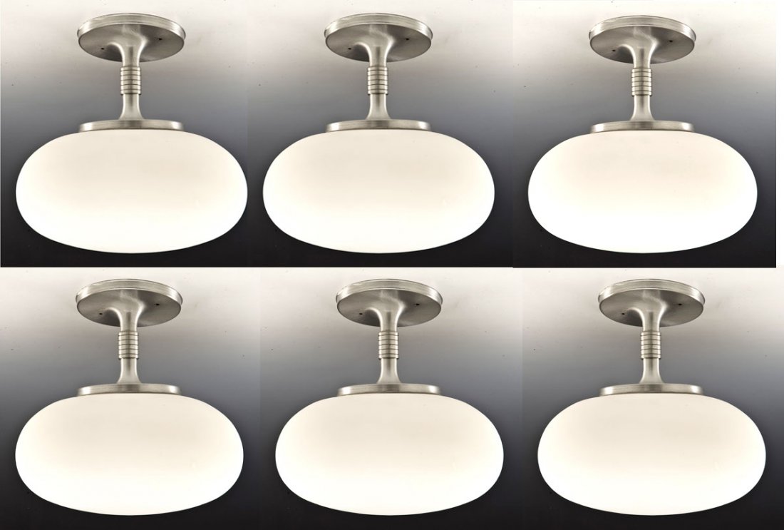6 Progress Lighting Mid-Century Ceiling Lights: DESCRIPTION: Six Progress Lighting mid-century ceiling lights. Each with brushed metal hanging frames and milky white shades. Each with labels "Electric Fixture Type I.C. Issue No. D-127,879 Progress 