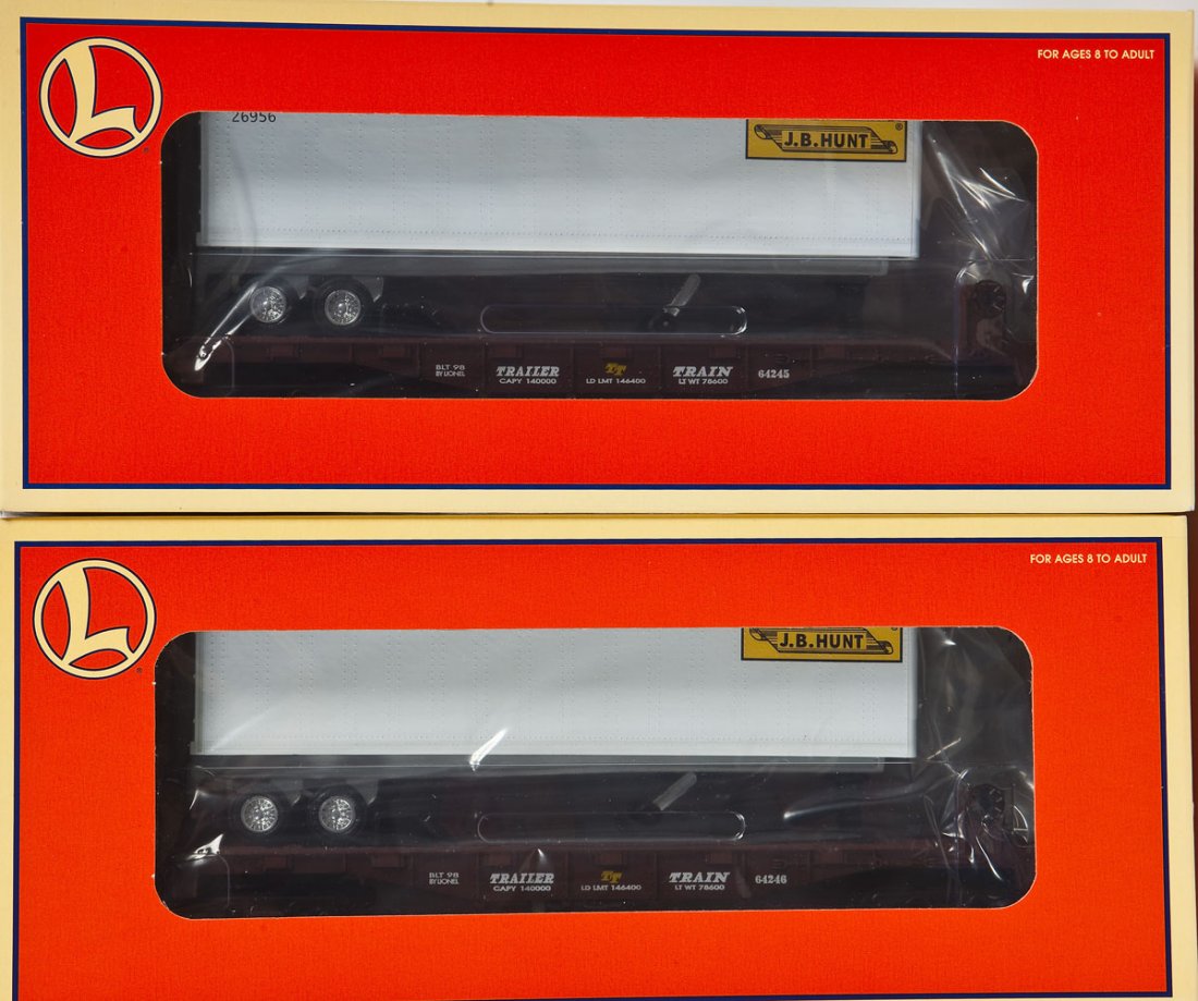 Lionel J.B. Hunt 2 Pack w/Trailers #6-36026: DESCRIPTION: Lionel O Gauge J.B. Hunt Two Pack Asst F/C - w/Trailer #6-36026. CONDITION: Appears unused in the original box.