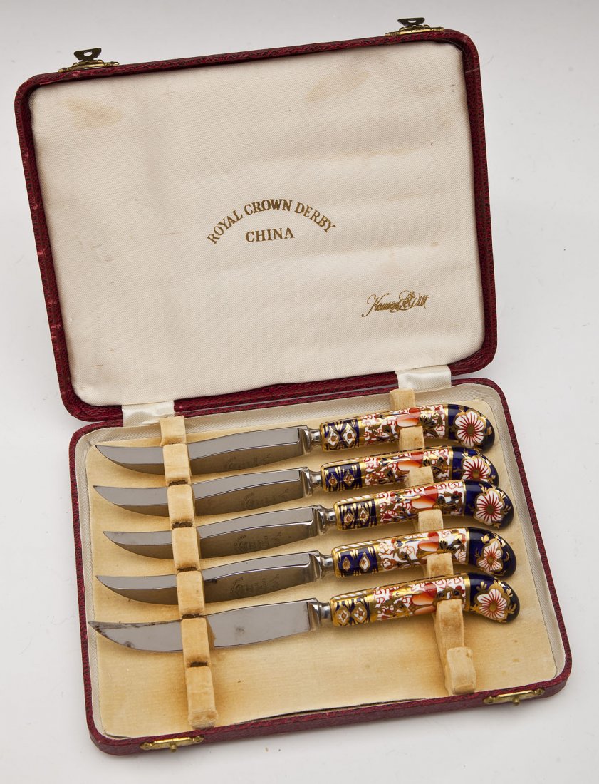 Set of 5 Royal Crown Derby Fruit & Cheese Knives: DESCRIPTION: Set of five Royal Crown Derby fruit and cheese knives with handpainted ceramic-handles. In original red case. Each knife marked "Royal Crown Derby MADE IN ENGLAND" on blade. MEASUREMENTS: