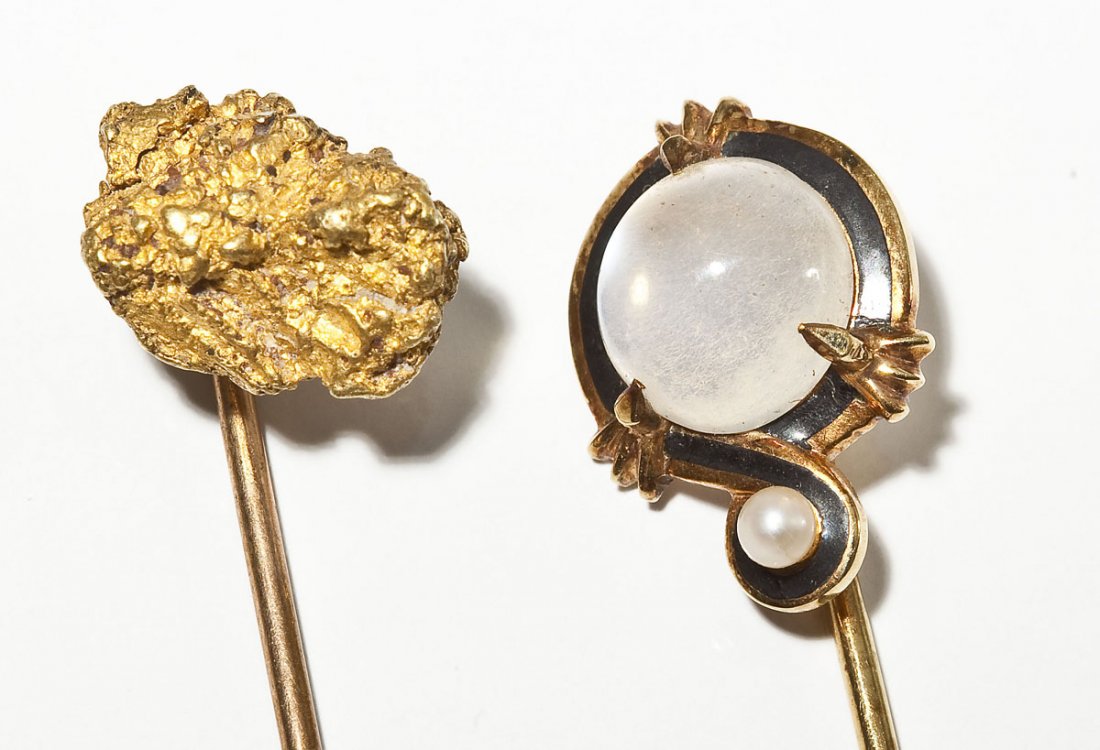 2 Antique Stickpins Nugget & Moonstone: DESCRIPTION: Two antique stickpins. Includes: 1) 2-1/4" with nugget. 2) 2-5/8" with moonstone cabochon, seed pearl and black enameling. Signed with monogram mark. MEASUREMENTS: See Description. CONDIT