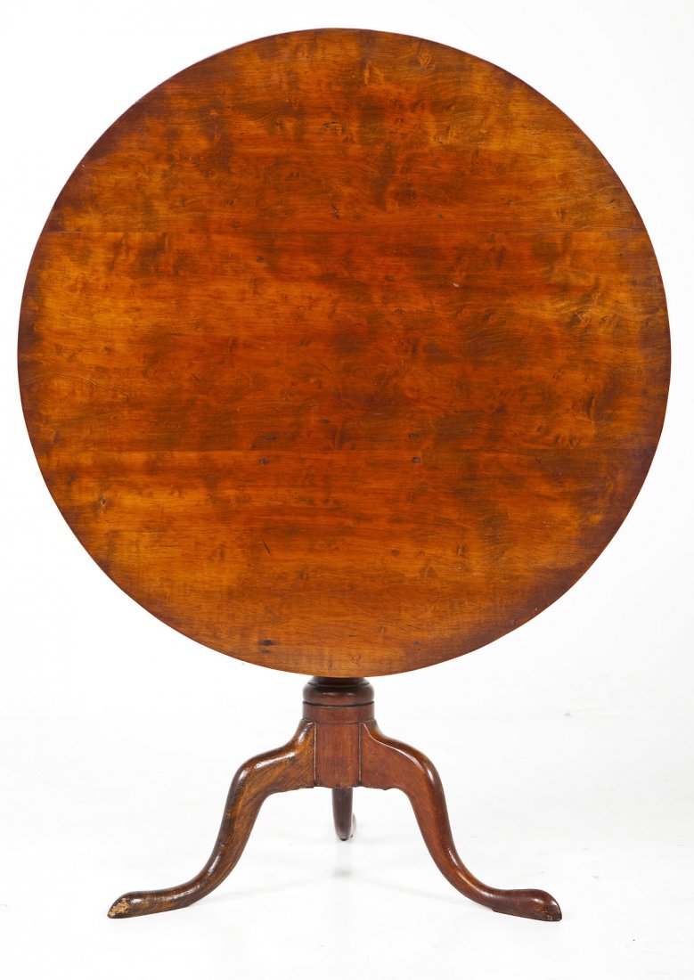 Pennsylvania Tilt Top Tea Table: DESCRIPTION: A Pennsylvania 18th century Queen Anne to Chippendale tilt top table consisting of snake feet rising to a central tapered urn shaft joining to a round tea table. Probably a birdcage tilt