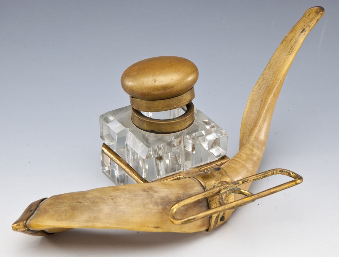 19th C Horn and Glass Inkwell: DESCRIPTION: Horn and glass inkwell with attached pen holder, unmarked. 19th century. MEASUREMENTS: 9-1/2" long. CONDITION: Metal end cap to horn missing screw. Warping to pen holder and well cap. Cap