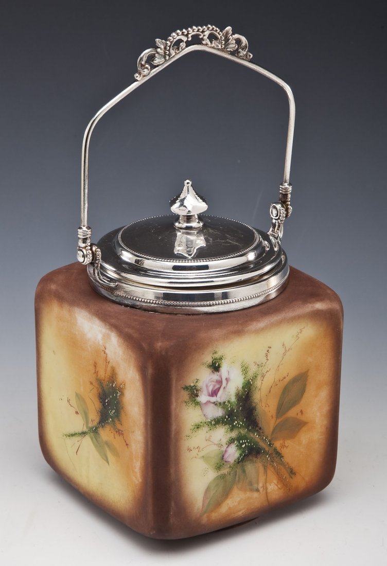 Pairpoint Mt. Washington Opaque Glass Biscuit Jar: DESCRIPTION: Pairpoint Mt. Washington opaque glass biscuit jar with silverplate lid and handle. Cube-shaped. Lid marked underneath "MW 3910". Handpainted with yellow, orange and brown tones with pink 