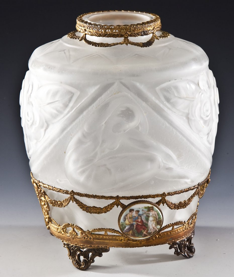 French Frosted Glass Vase in Ormolu Stand: DESCRIPTION: Frosted glass vase patterned with nudes and flowers. In an ormolu stand with floral swags and handpainted porcelain medallions with four Greek-style figures. Vase marked "Made in France".