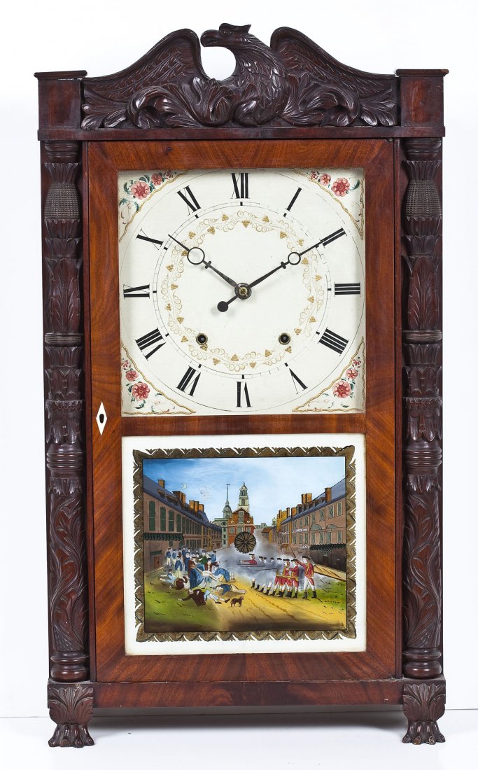 Eli Terry & Sons Column Clock with Eagle Finial: DESCRIPTION: Eli Terry & Sons column clock with eagle finial, carved columns, claw-feet, reverse painted panel, and handpainted wooden face with floral and scrolling motifs. MEASUREMENTS: 31" tall x 1