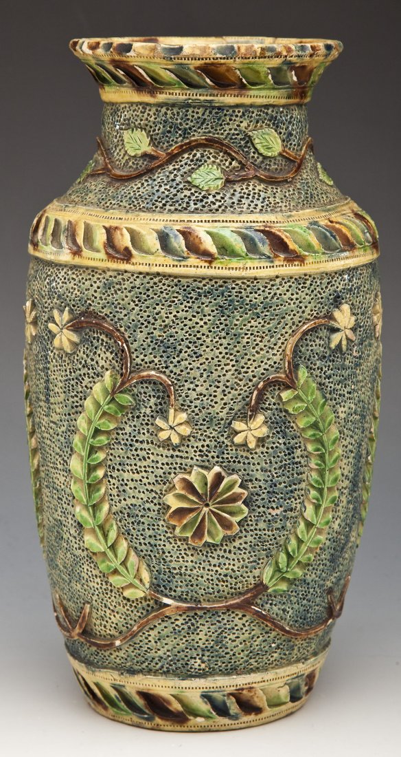 Dutch Ceramic Art Pottery vase: DESCRIPTION: Dutch ceramic art pottery vase with relief rosettes, vines, and flowers. Handpainted. Marked "Holland No 116" on base. MEASUREMENTS: 10-1/4" tall x 5" at widest point. CONDITION: Evidence