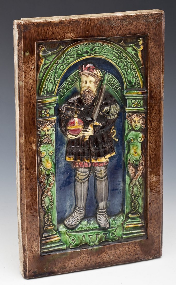 16th C Ceramic German Stove Tile: DESCRIPTION: 16th century ceramic German stove tile with figure of a bearded gentleman wearing a colorful tunic and holding globus cruciger and a sword. Figure standing in archway supported by columns