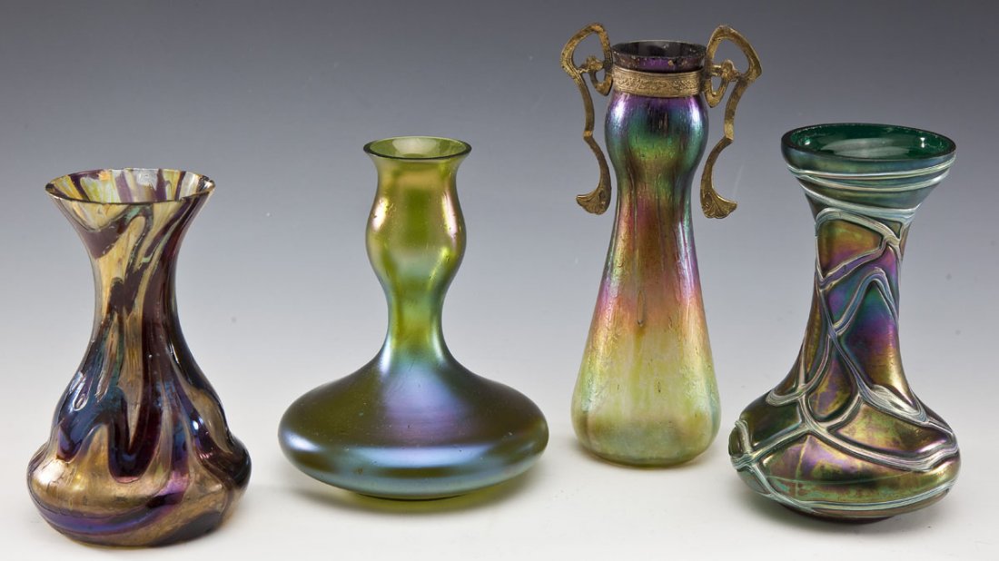 4 Pcs Loetz Type Art Glass: DESCRIPTION: Four pieces Loetz type art glass. Including: 1) Iridescent green vase. 5-5/8" high. 2) Iridescent green and purple vase with webbed lines throughout. 6" high. 3) Red and yellow iridescent
