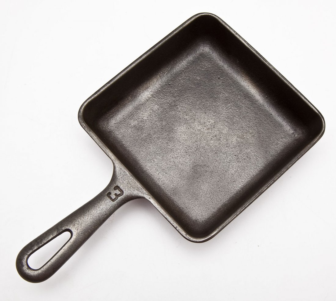 Griswold No. 3 Square-Fry Skillet, Block Logo: DESCRIPTION: Griswold No. 3 Square-Fry Skillet, Block Logo, Erie, PA, Grooved Handle. Catalog/Part No: 2103. MEASUREMENTS: 9-1/8" long. CONDITION: No defects noted.