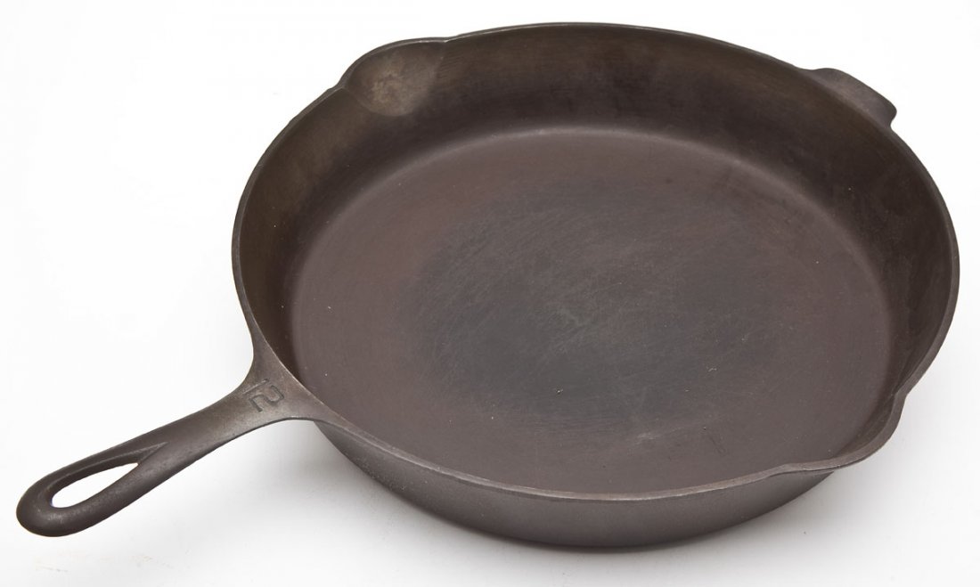 Griswold No. 12, Block Logo: DESCRIPTION: Griswold No. 12, Block Logo, S/R, EPU. Catalog/Part No: 719. MEASUREMENTS: 18-3/4" long. CONDITION: Minor wear as expected with age.