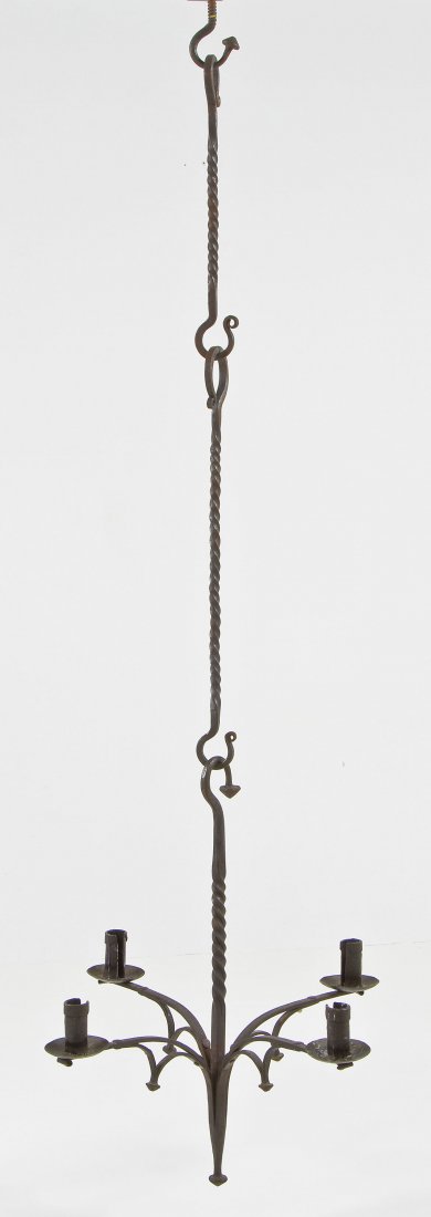 Hand Wrought Iron Four-Light Chandelier: DESCRIPTION: Hand wrought iron four-light chandelier. Smithed by John Tyler of Carlisle. Four pieces in total. MEASUREMENTS: 56-1/2" full length. CONDITION: Wear throughout consistent with age. Minor 