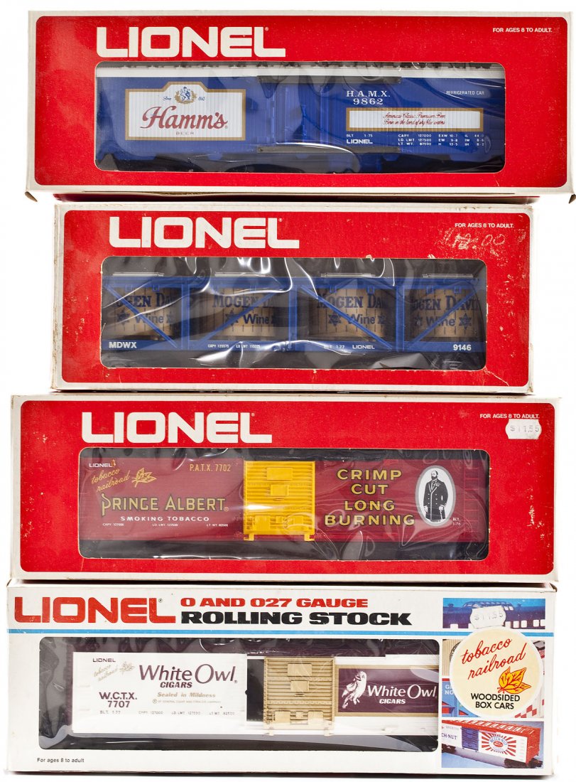 4 Lionel O Gauge Freight Cars in OBs: DESCRIPTION: Four Lionel O gauge freight cars in original boxes. Includes: 1) White Owl Boxcar 6-7707 2) Mogen David Wine Car 6-9146 3) Prince Albert Boxcar 6-7702 4) Hamm's Billboard Reefer 6-9862. E