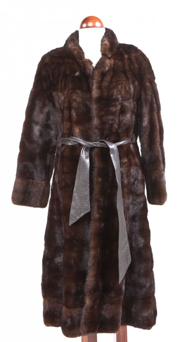 Full Length Mink Coat by Chambers Sherwin: DESCRIPTION: Full length mink coat with an interior label marked "Chambers Sherwin New York", with three hook and eye closures. Leather tie to waist. MEASUREMENTS: 48". CONDITION: No defects noted.