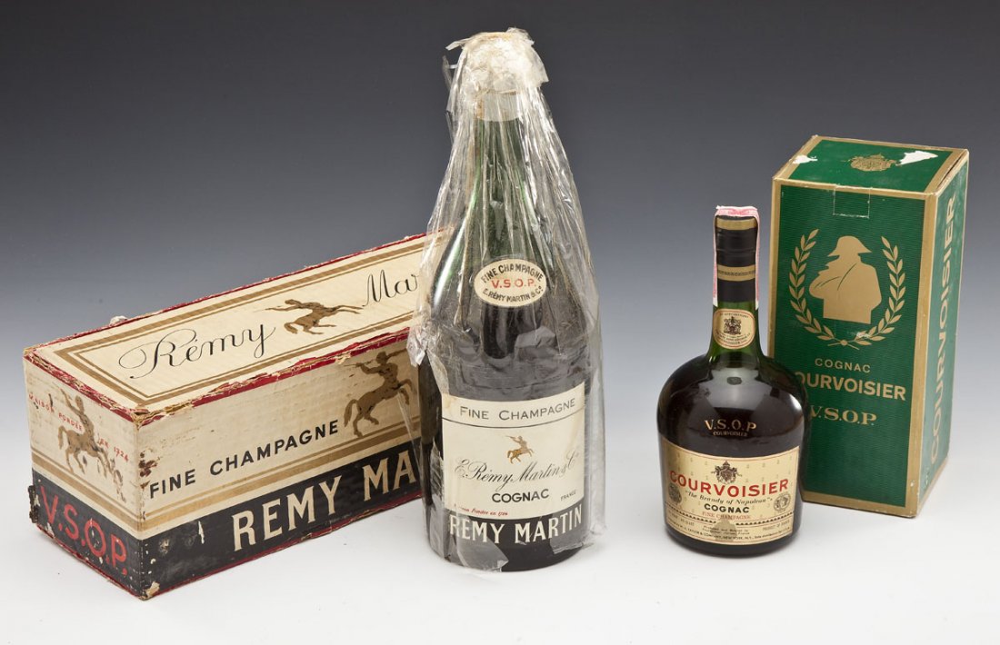 2 Bottles of Cognac (Courvoisier & Remy Martin): DESCRIPTION: Two bottles of cognac fine champagne. Includes a bottle of Courvoisier and a bottle of Remy Martin, both come with original boxes. The Courvoisier is 4/5 quart and the label reads "Courvo