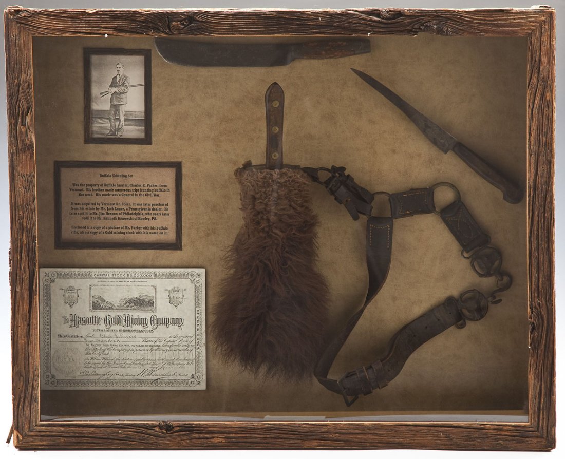 19th C Buffalo Skinning Set of Charles E. Parker: DESCRIPTION: 19th century buffalo skinning set in shadow box. Three knives, knife block trimmed with fur and adjustable waist belt. Includes copy of gold stock certificate and photograph of Charles E.