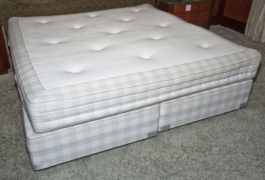 Hastens King Size Mattress and Box Springs: DESCRIPTION: King size mattress and box springs by Hastens. MEASUREMENTS: King size. CONDITION: No defects noted.
