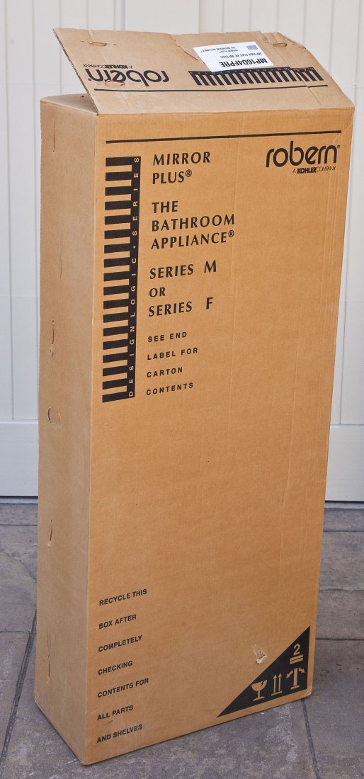 Roburn Design Logic M Series Medicine Cabinet: DESCRIPTION: Design Logic Series Roburn by Kohler medicine cabinet. Model MP16D4FPRE, serial number X51468. MEASUREMENTS: Box measures 21" x 9-1/2" x 49-1/2". CONDITION: Unused in original box.