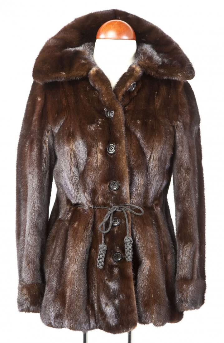 Womens 5 Button Mink Jacket: DESCRIPTION: Woman's five-button mink jacket. Satin lining. Pinecone tie at front. MEASUREMENTS: 22" sleeve length, 17" shoulder to shoulder, 28-1/2" hem to shoulder. CONDITION: Minor wear to interior