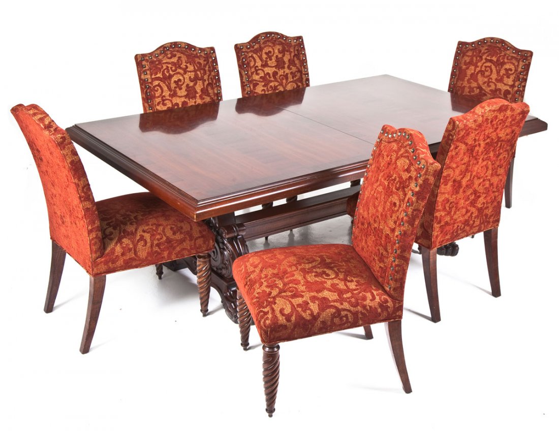 Henredon Renaissance Revival Table and Chairs: DESCRIPTION: A late 20th century Renaissance revival trestle table of mahogany and mixed woods with elaborately carved paw footed supports. Accompanied by six barley twist leg overstuffed Renaissance