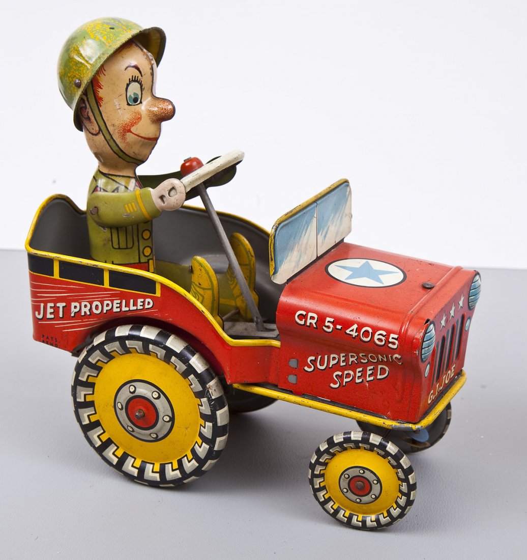 Watch Joe Go Toy: DESCRIPTION: Watch Joe Go wind-up toy by Unique Art. MEASUREMENTS: 8" wide x 8" high. CONDITION: Good.